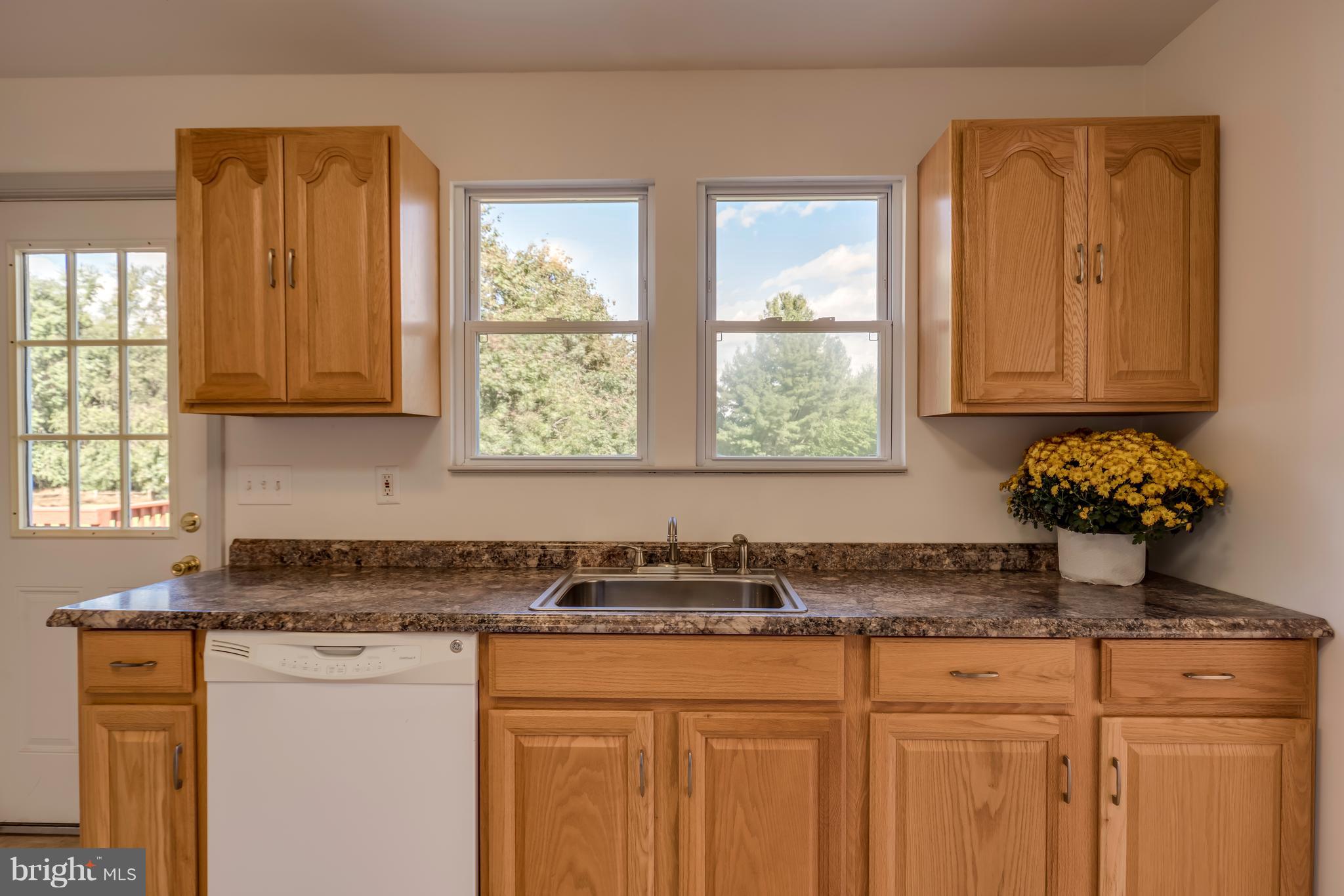 13327 Fork Road Baldwin, MD 21013 - Photo 5 of 23 Windows over the sink and deck just out back