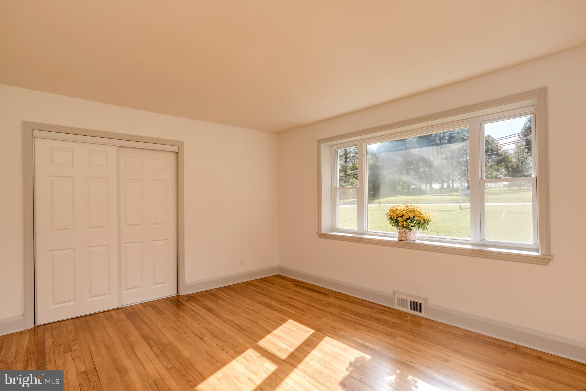 13327 Fork Road Baldwin, MD 21013 - Photo 10 of 23 First floor bedroom with beautiful hardwood floors