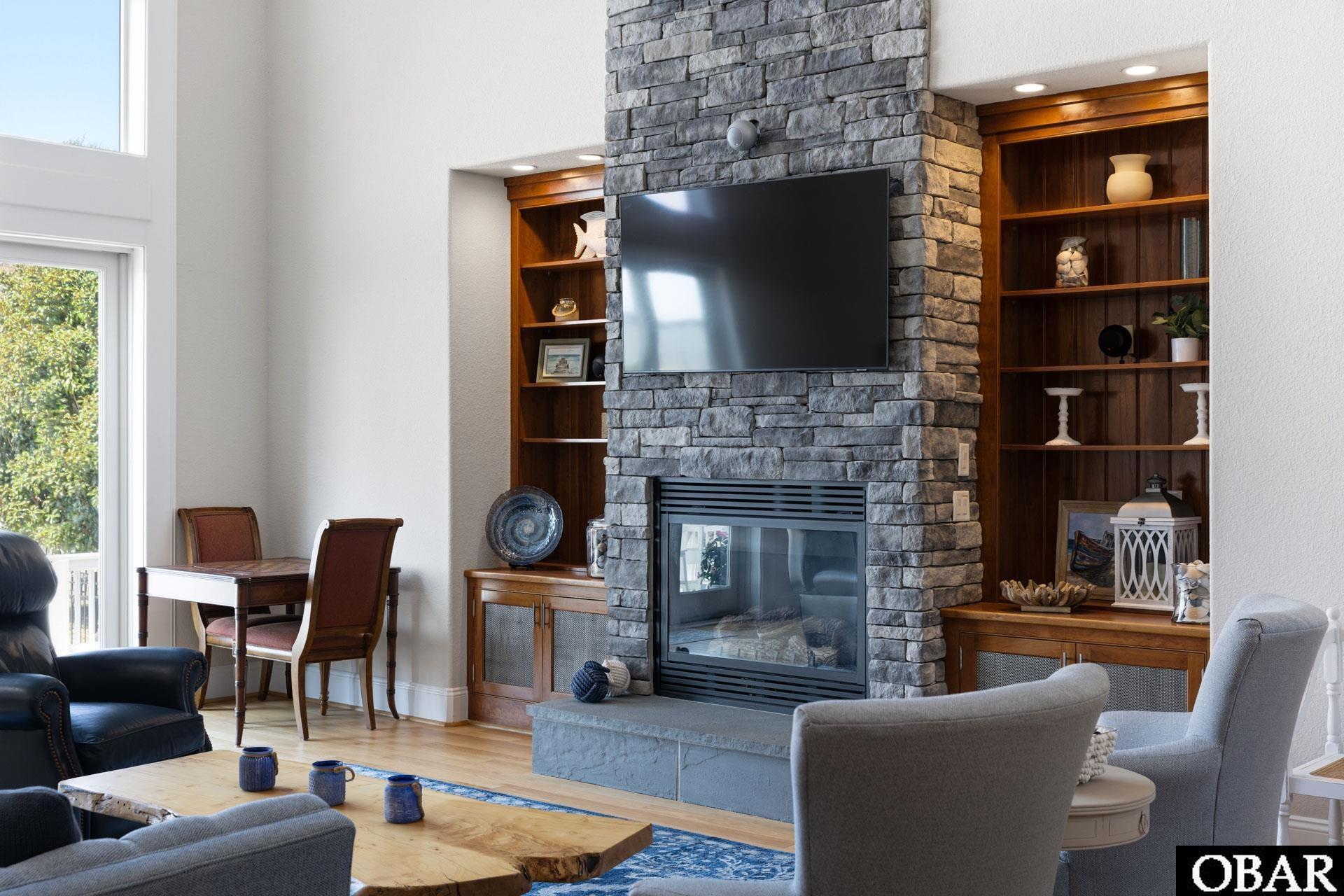 1044 Martins Point Road, Unit 11 Kitty Hawk, NC 27949 - Photo 15 of 50 Stone Fireplace w/Custom Cabinetry