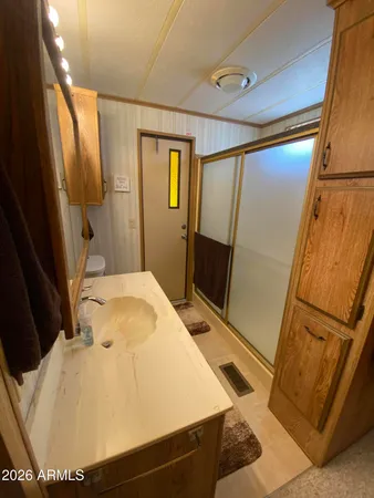 a bathroom with a tub and shower