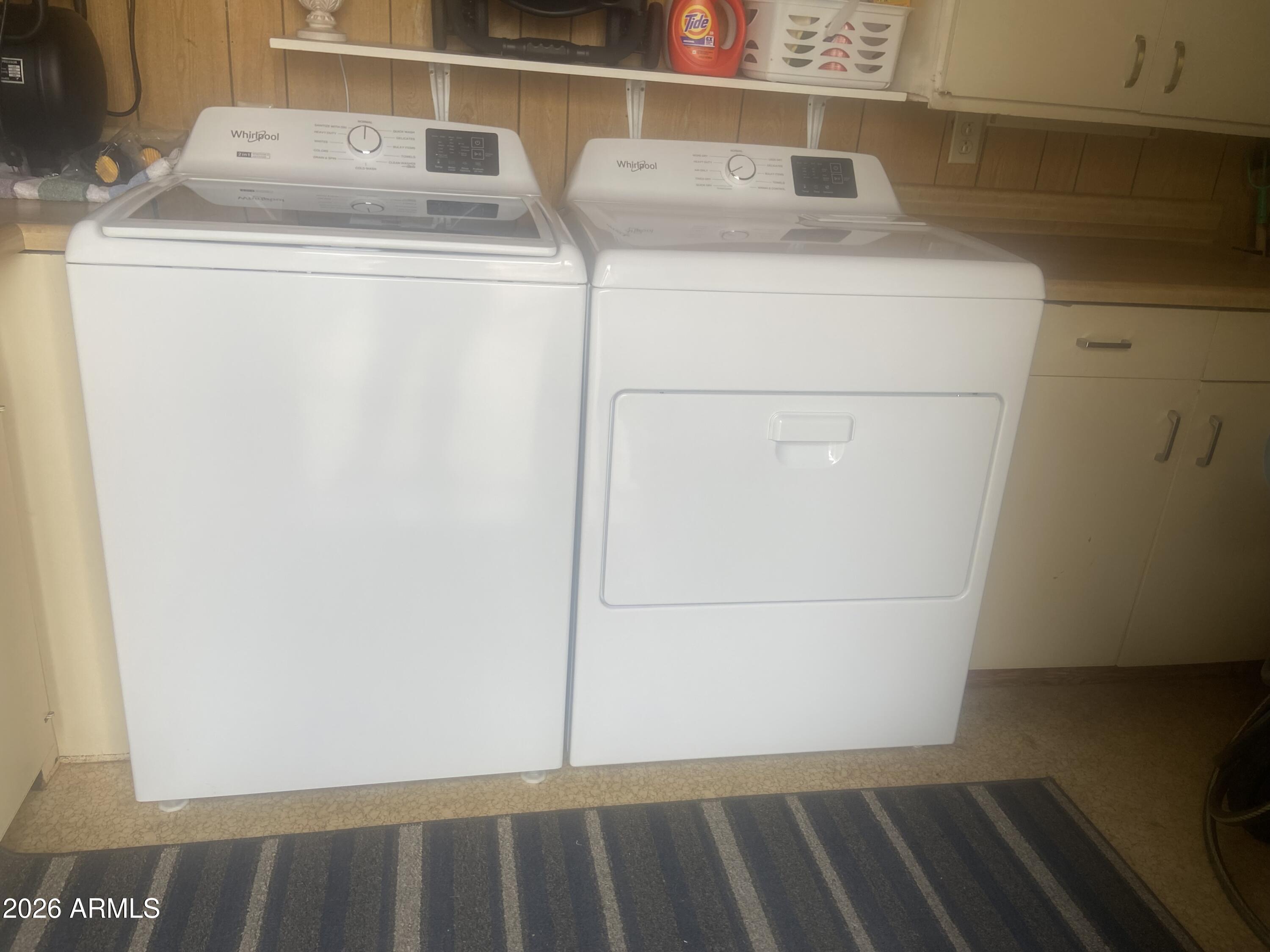 1340 West Inuit Avenue Apache Junction, AZ 85119 - Photo 18 of 30 a utility room with dryer and washer