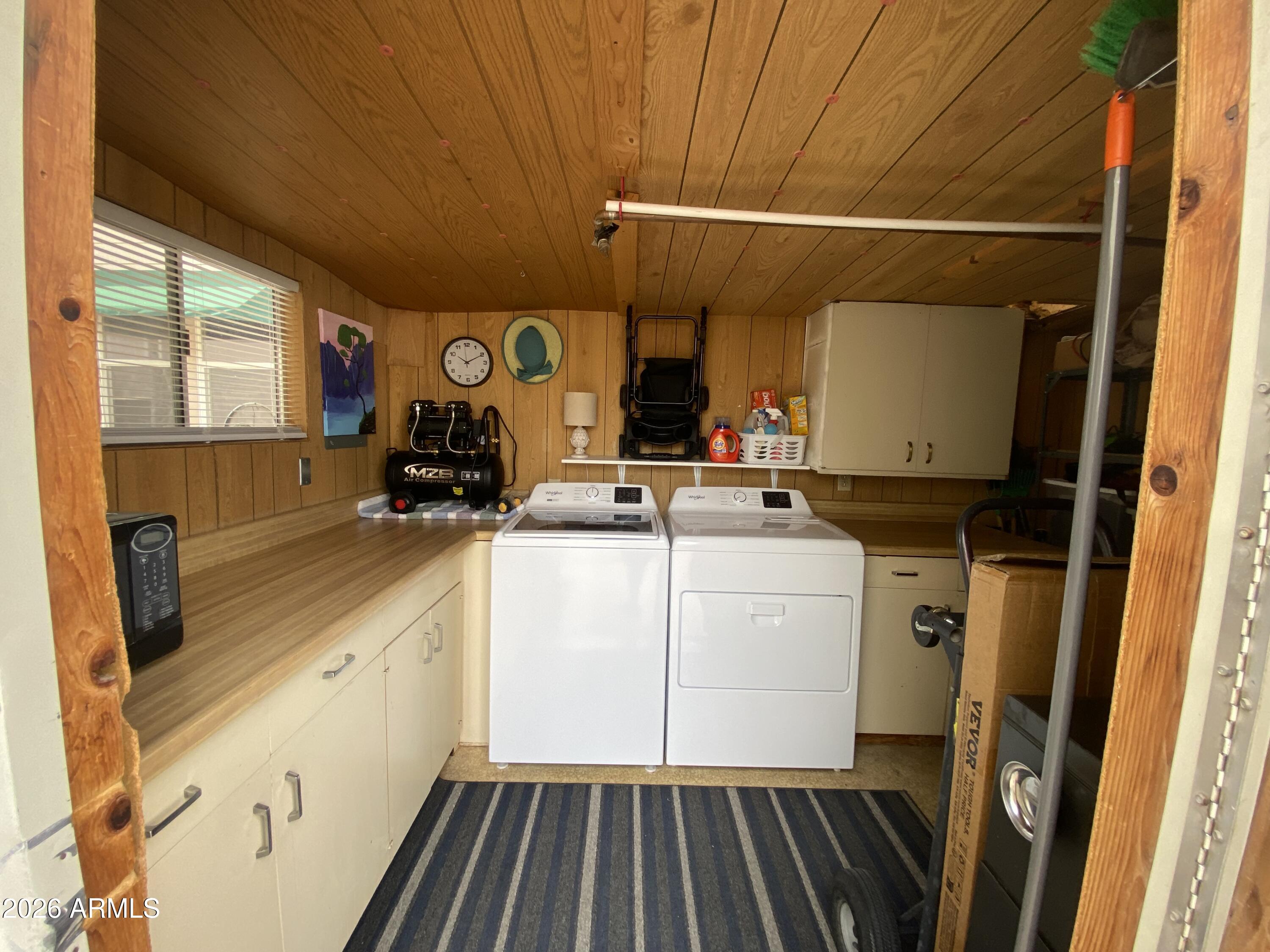 1340 West Inuit Avenue Apache Junction, AZ 85119 - Photo 19 of 30 a room with storage and utility