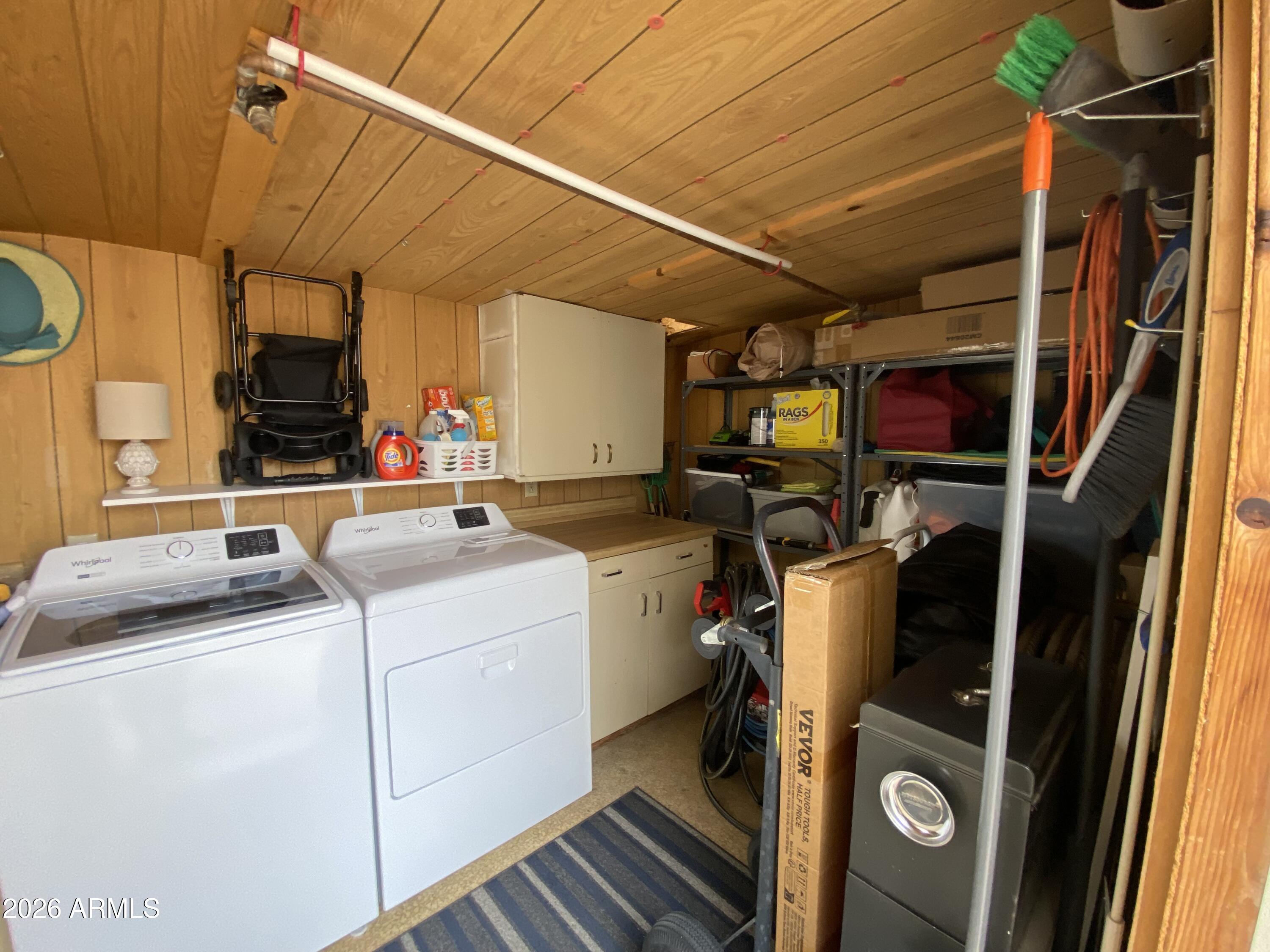 1340 West Inuit Avenue Apache Junction, AZ 85119 - Photo 20 of 30 a utility room with dryer and washer