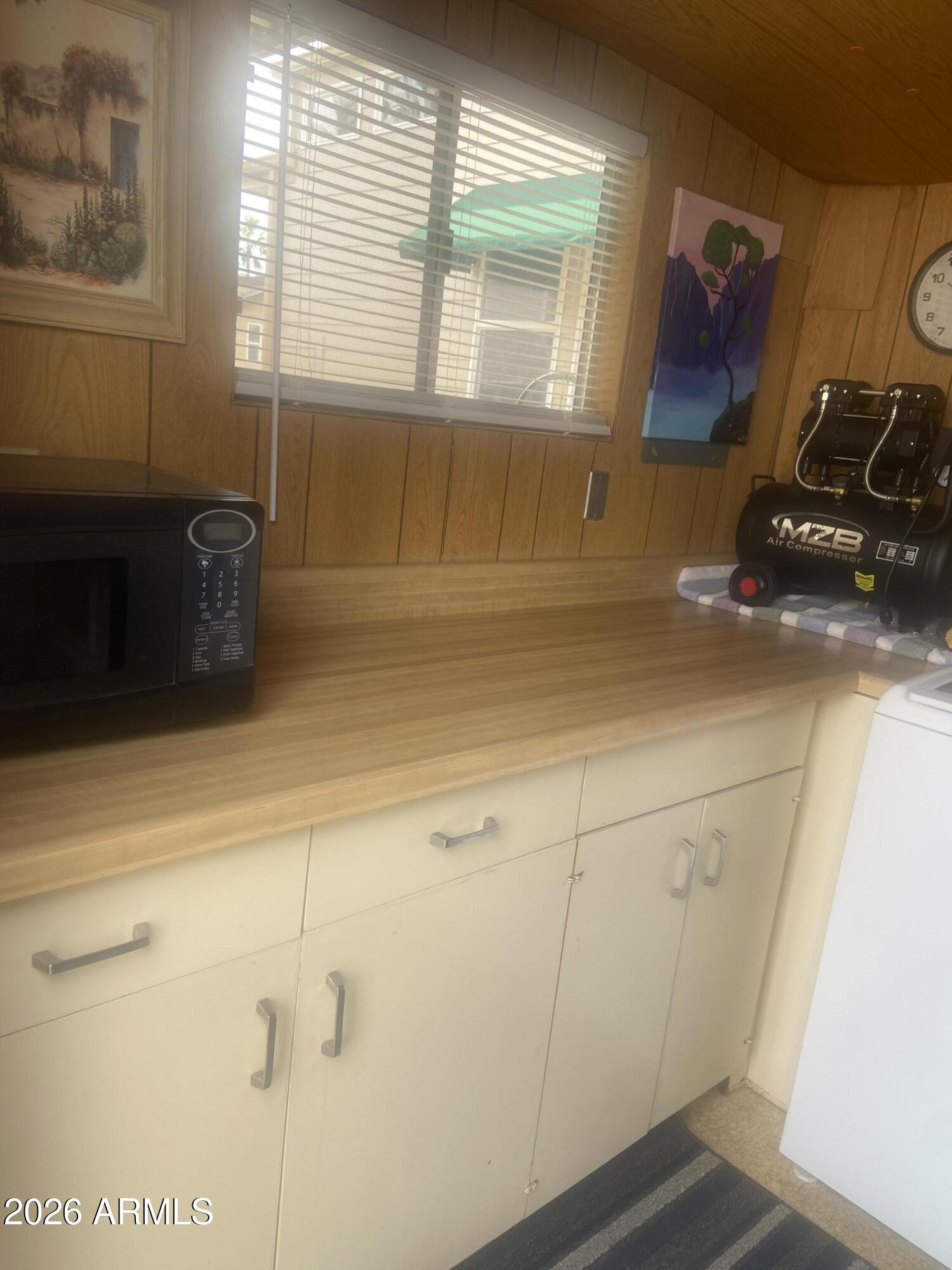 1340 West Inuit Avenue Apache Junction, AZ 85119 - Photo 21 of 30 a bathroom with a sink and a vanity