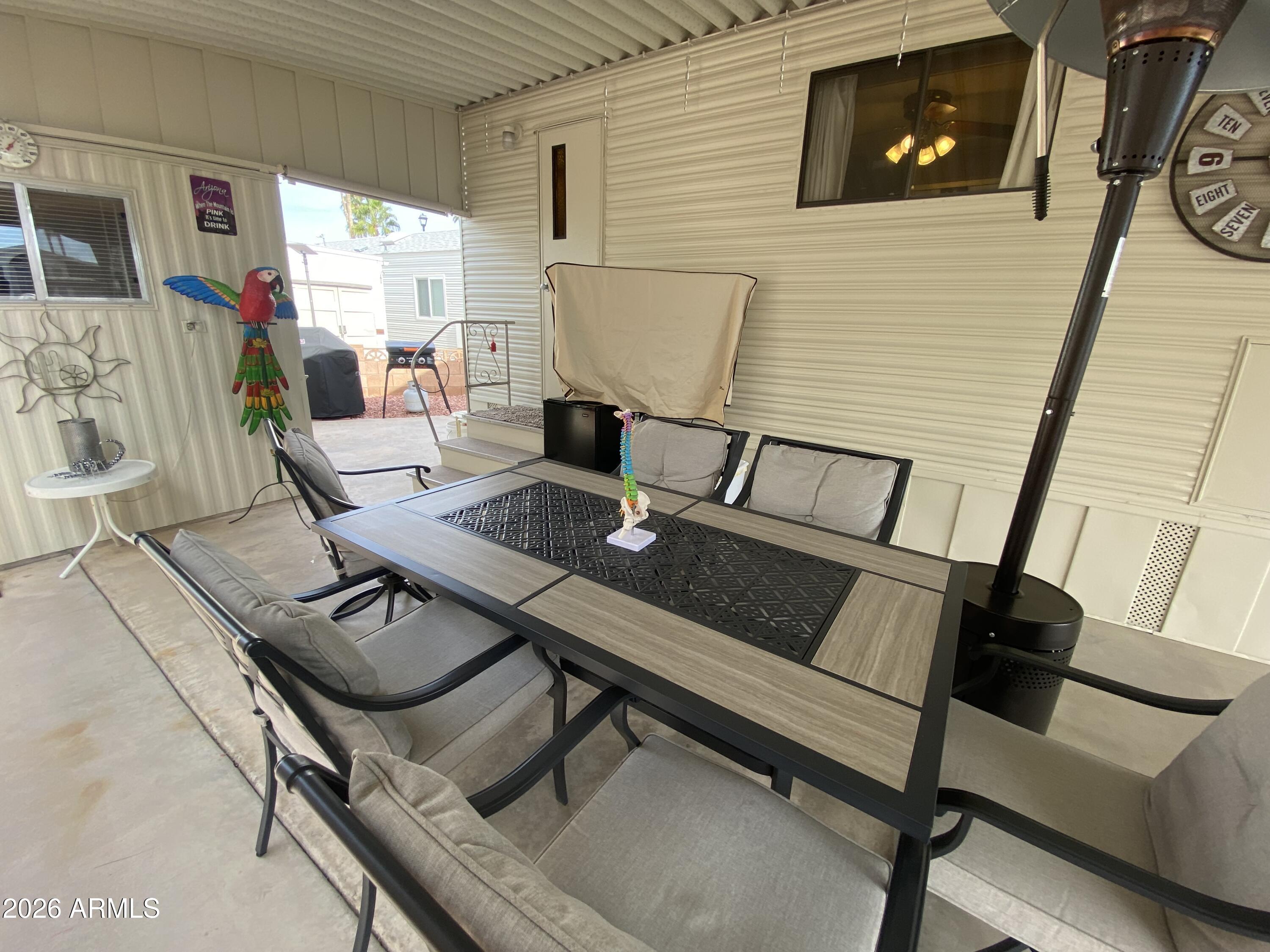 1340 West Inuit Avenue Apache Junction, AZ 85119 - Photo 25 of 30 a view of a workspace with furniture