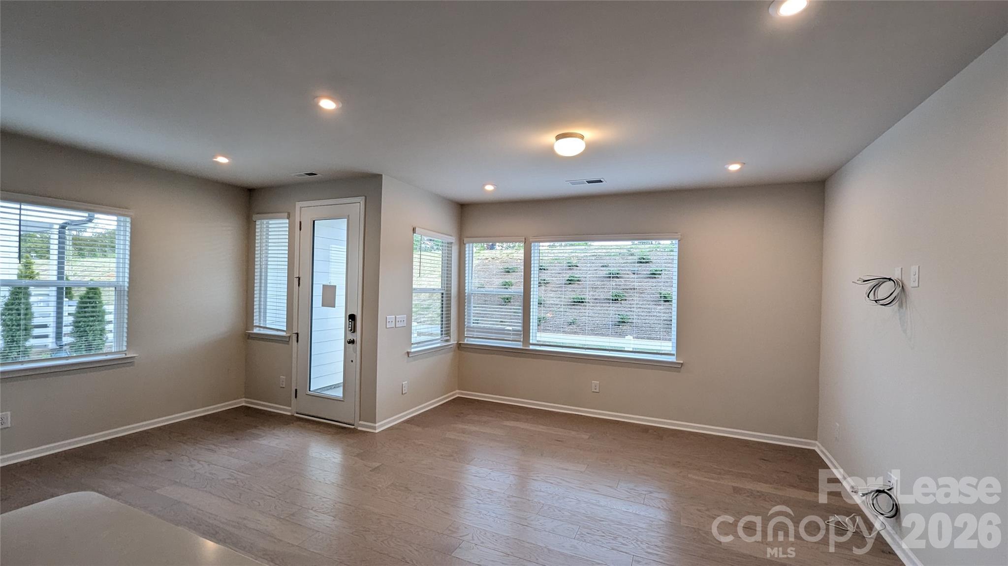 1276 Brawley School Road, Unit F Mooresville, NC 28117 - Photo 12 of 21 a view of an empty room with a window