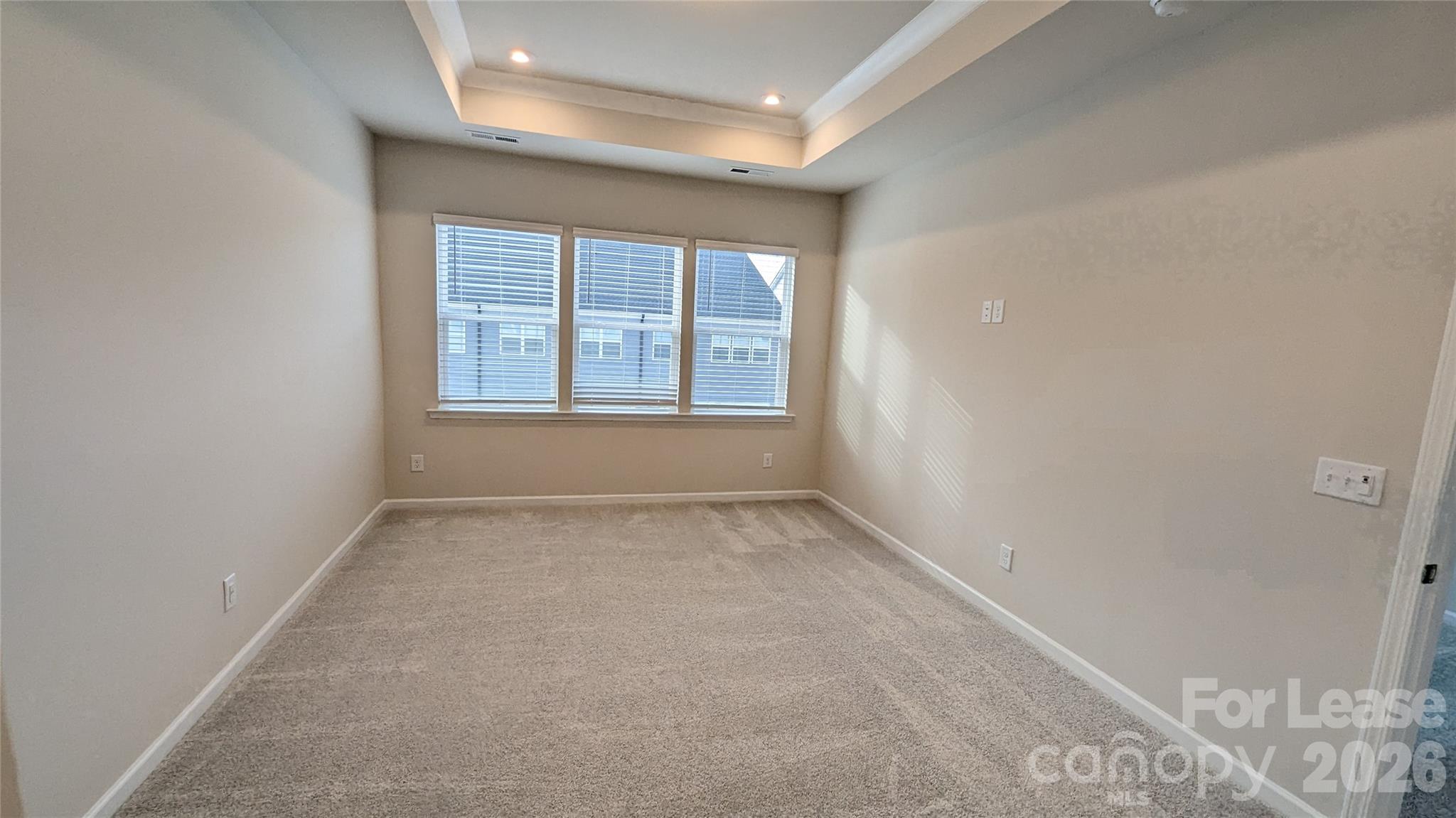 1276 Brawley School Road, Unit F Mooresville, NC 28117 - Photo 15 of 21 an empty room with a empty space and windows
