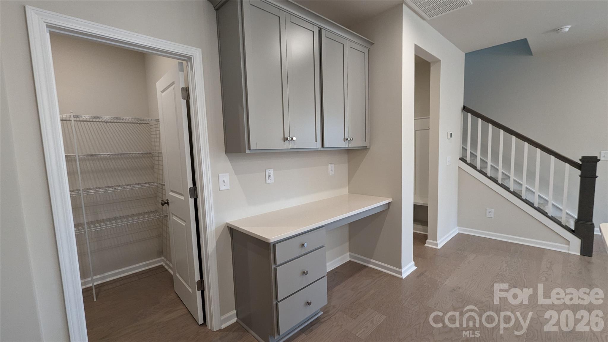 1276 Brawley School Road, Unit F Mooresville, NC 28117 - Photo 16 of 21 a view of cabinets and wooden floor