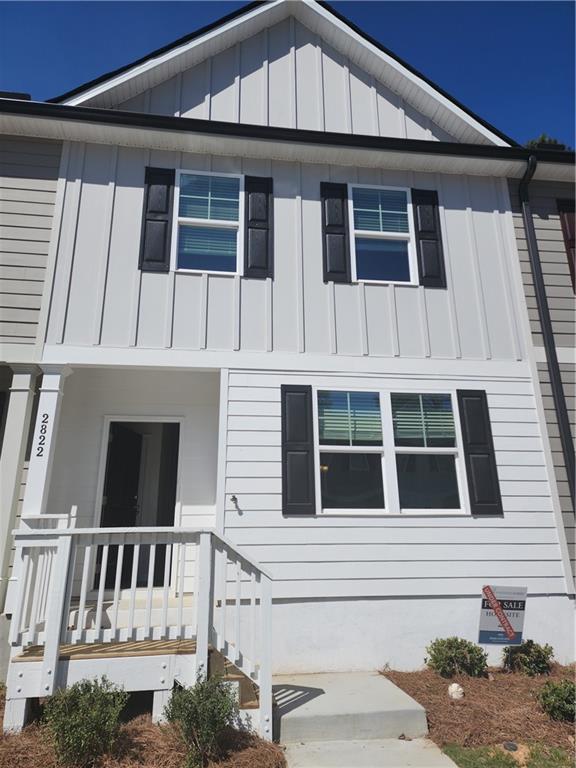 a front view of a house with windows