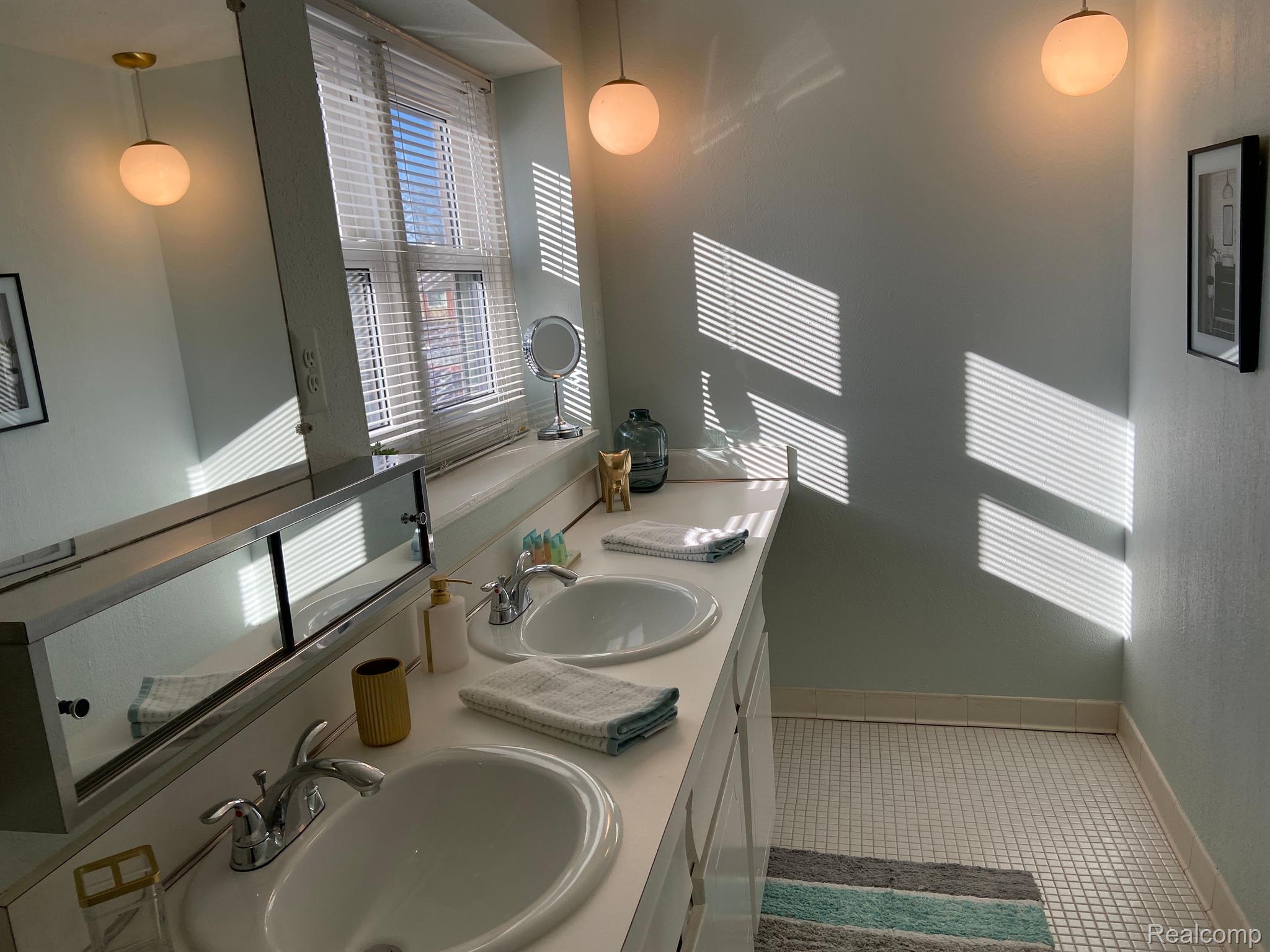 5045 North Crooks Road, Unit 20 Royal Oak, MI 48073 - Photo 34 of 46 Full Bathroom with double sinks on second floor.