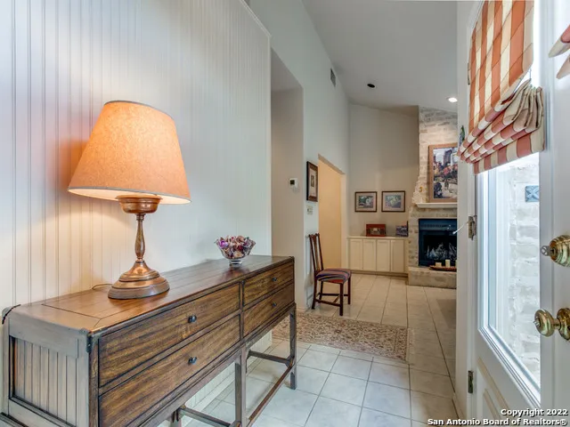 a dining room with table and chairs