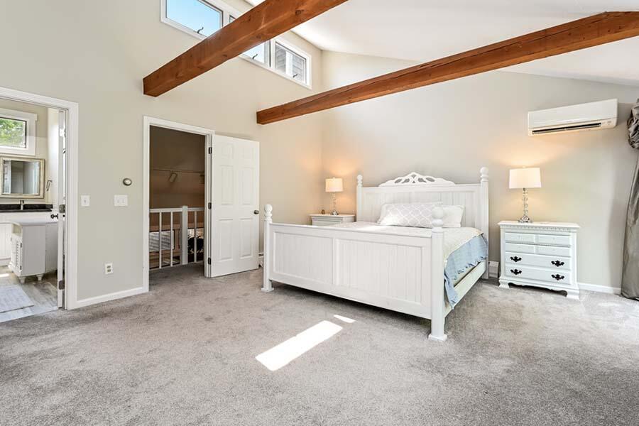 15 Riverview Avenue, Unit B Mashpee, MA 02649 - Photo 15 of 28 a room with a bed and a cabinets