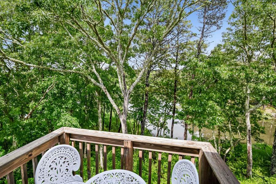15 Riverview Avenue, Unit B Mashpee, MA 02649 - Photo 16 of 28 a view of a two chairs in the balcony