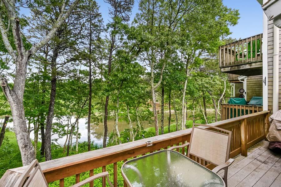 15 Riverview Avenue, Unit B Mashpee, MA 02649 - Photo 23 of 28 a view of a two chair in the balcony