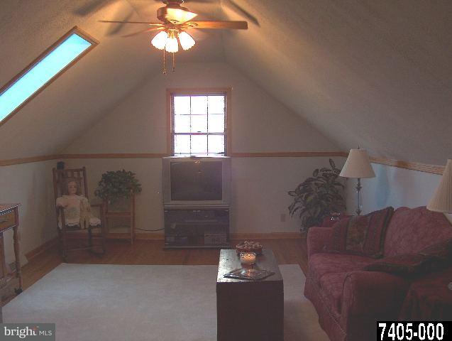2760 Stoverstown Road, Unit 5 Spring Grove, PA 17362 - Photo 7 of 9 a living room with furniture and a window
