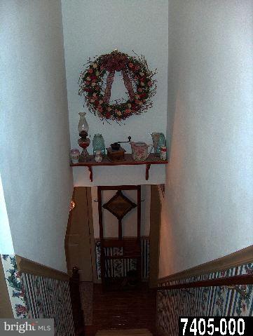 2760 Stoverstown Road, Unit 5 Spring Grove, PA 17362 - Photo 8 of 9 a table with chairs in wooden floor