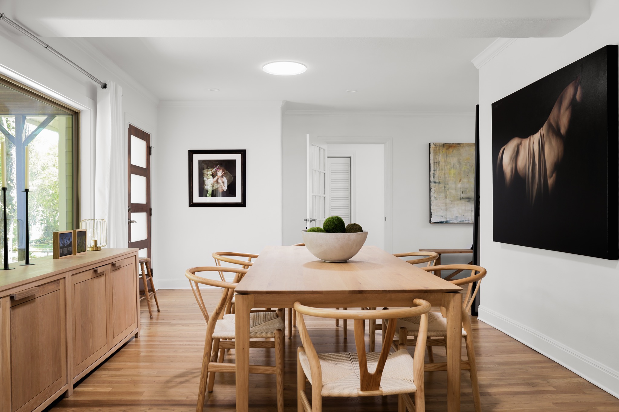 2803 Bridle Path Austin, TX 78703 - Photo 1 of 21 Dining space featuring light wood-type flooring and ornamental molding