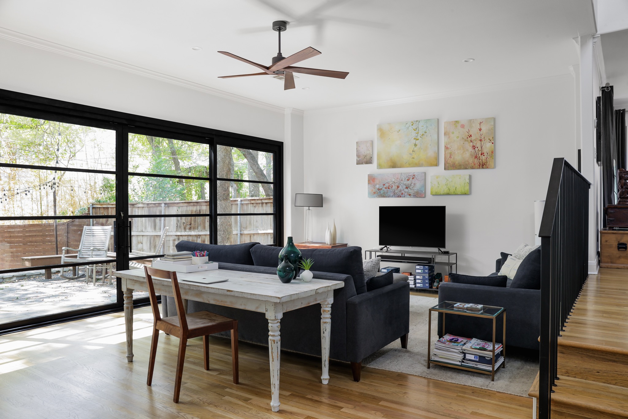 2803 Bridle Path Austin, TX 78703 - Photo 8 of 21 Living area featuring light wood-type flooring, ceiling fan, and crown molding