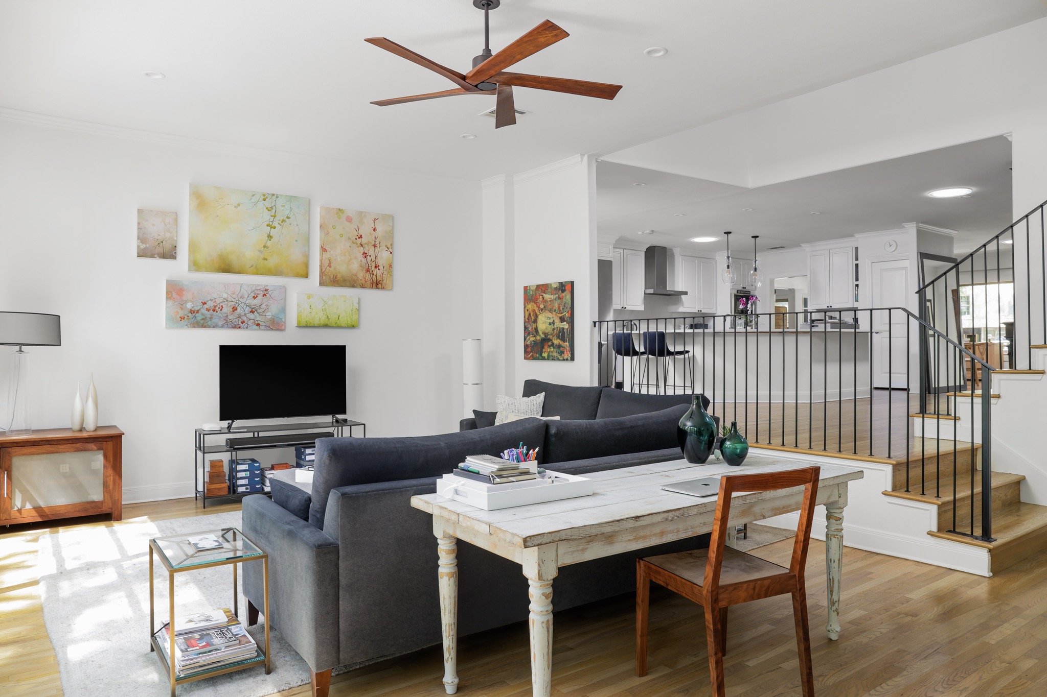 2803 Bridle Path Austin, TX 78703 - Photo 9 of 21 Living area with ceiling fan and light wood finished floors