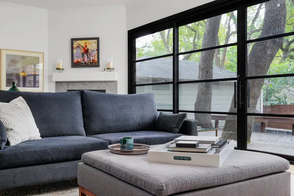 a living room with furniture and a window
