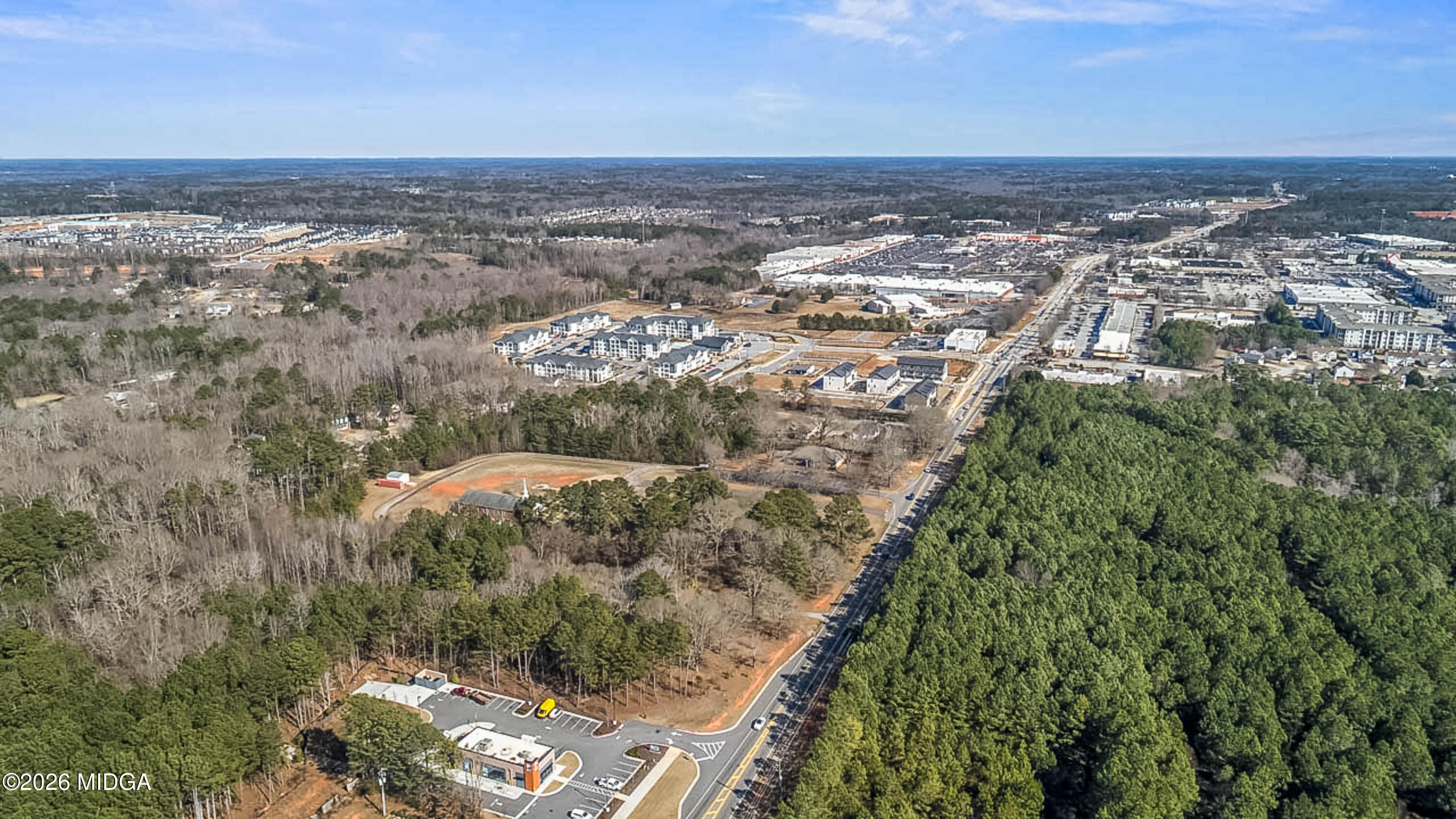 2226 Jonesboro Road McDonough, GA 30253 - Photo 2 of 8 an aerial view of a house with a ocean view