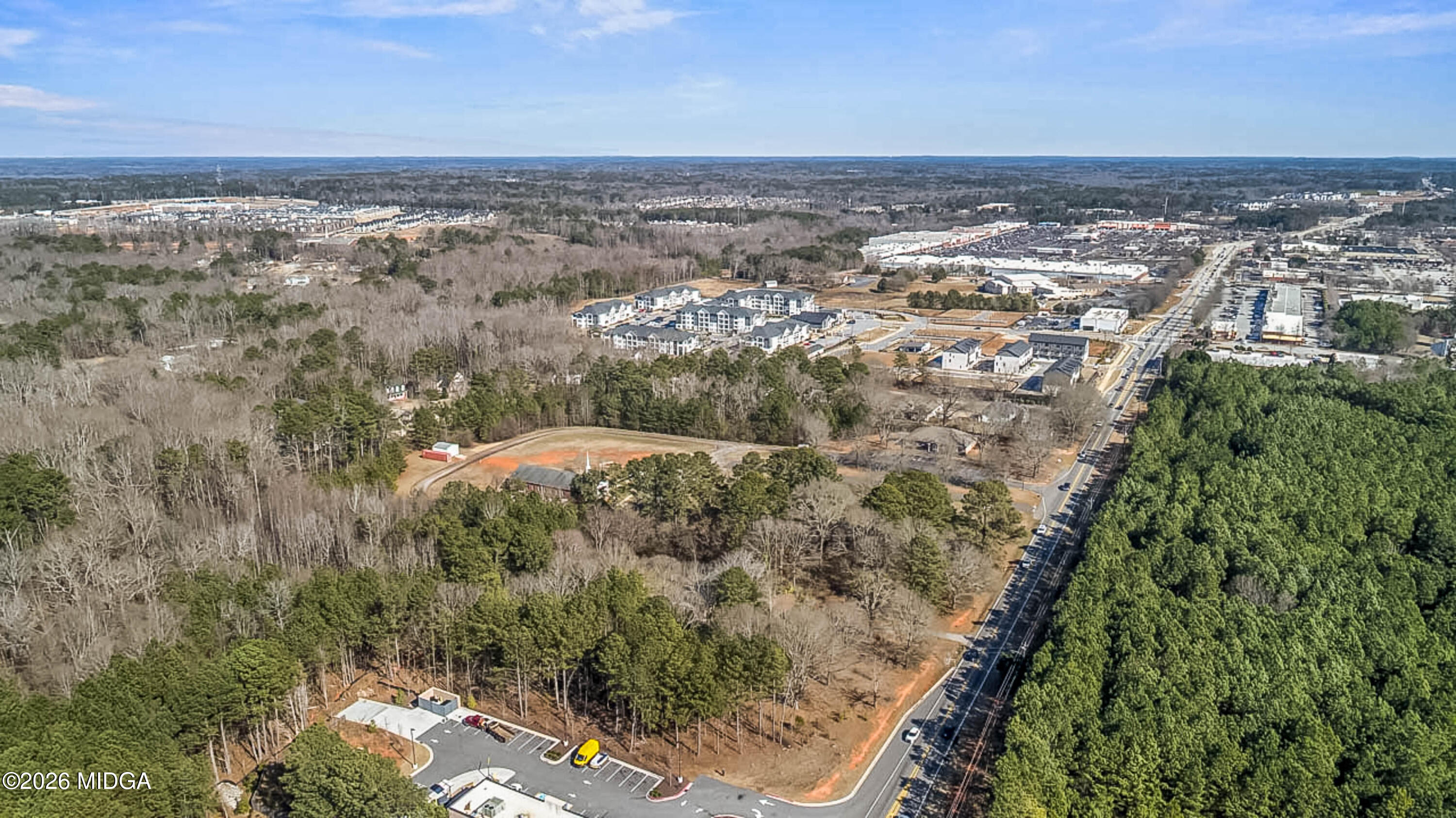 2226 Jonesboro Road McDonough, GA 30253 - Photo 4 of 8 an aerial view of a house with a yard