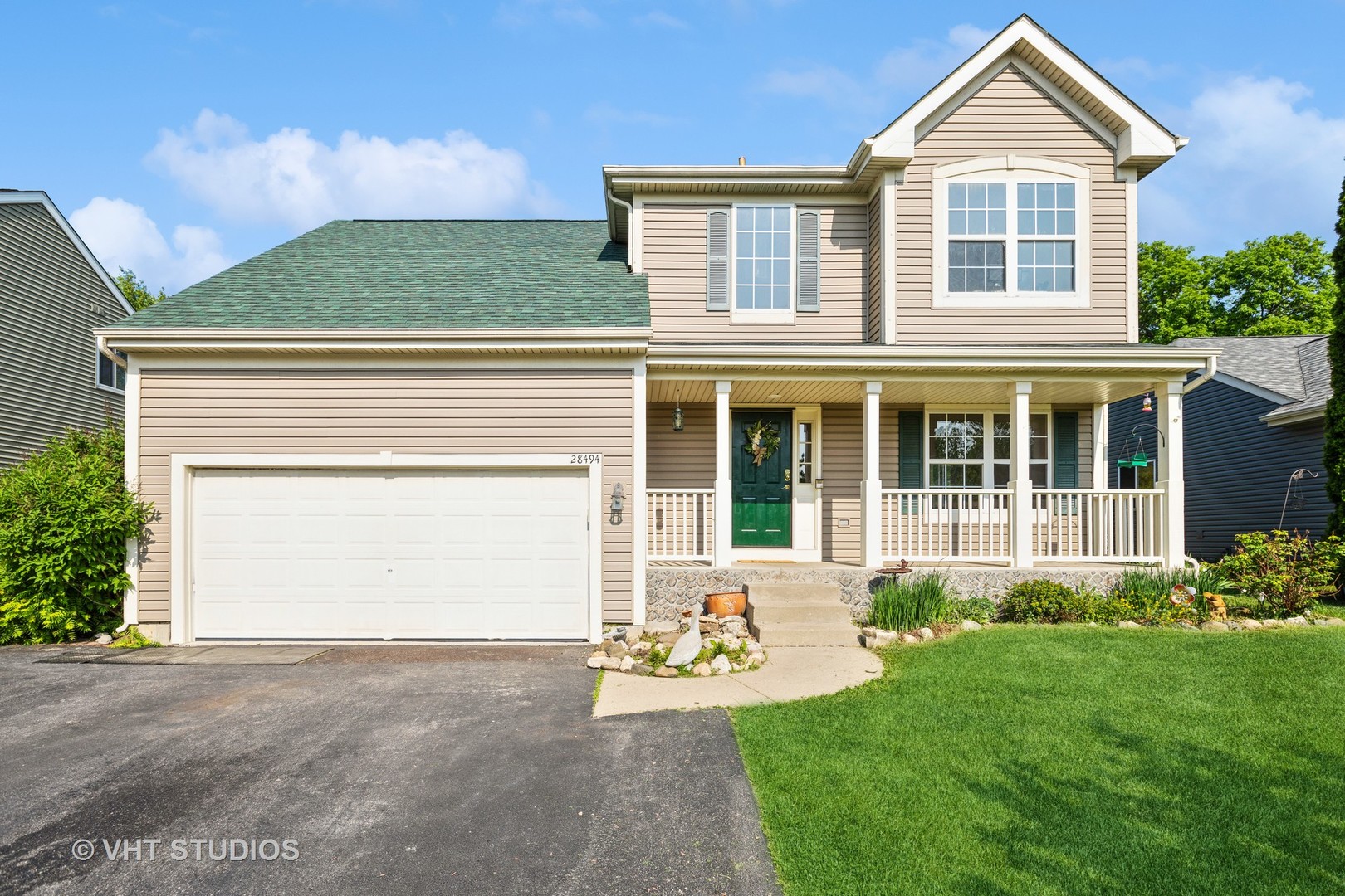 28494 Wagon Trail Road Lakemoor, IL 60051 - Photo 1 of 17 front view of a house with a yard