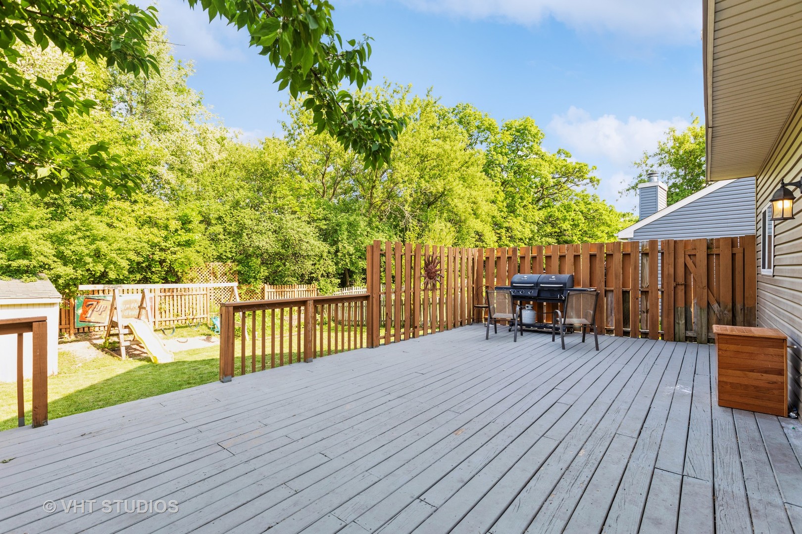 28494 Wagon Trail Road Lakemoor, IL 60051 - Photo 15 of 17 a view of backyard with deck and wooden floor