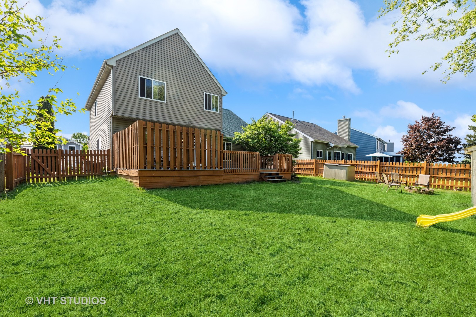28494 Wagon Trail Road Lakemoor, IL 60051 - Photo 17 of 17 a view of a house with a backyard