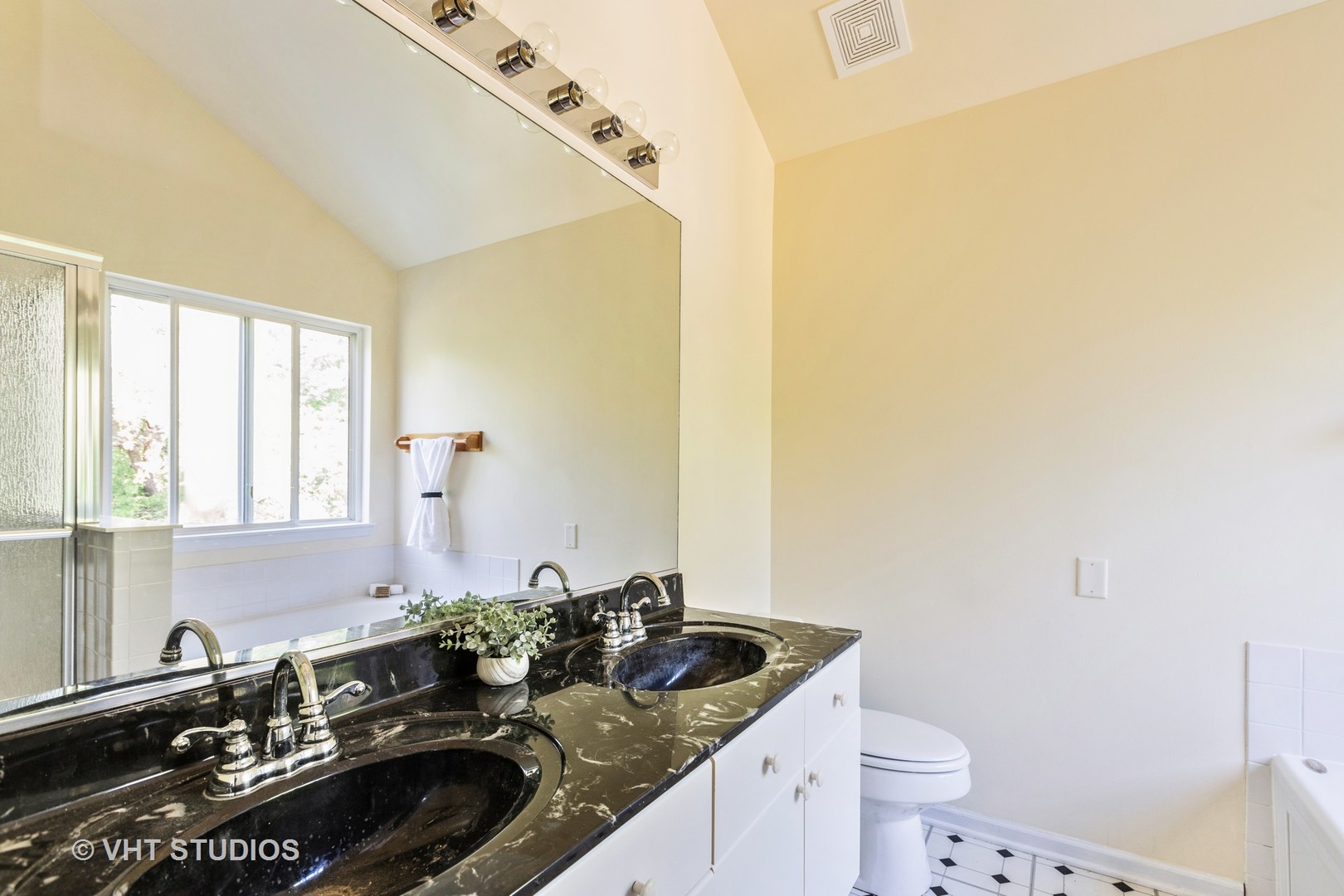 28494 Wagon Trail Road Lakemoor, IL 60051 - Photo 9 of 17 a bathroom with a granite countertop sink a toilet and a mirror