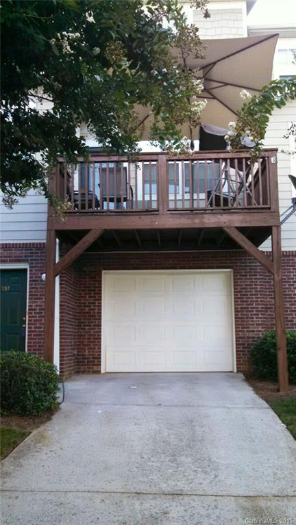137 High Ridge Road, Unit 64 Mooresville, NC 28117 - Photo 2 of 5 a view of house with outdoor space and parking