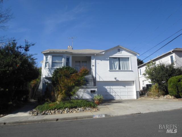 153 Edgemont Avenue Vallejo, CA 94590 - Photo 1 of 1 a front view of a house with a garden