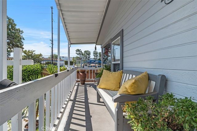 a view of balcony with furniture