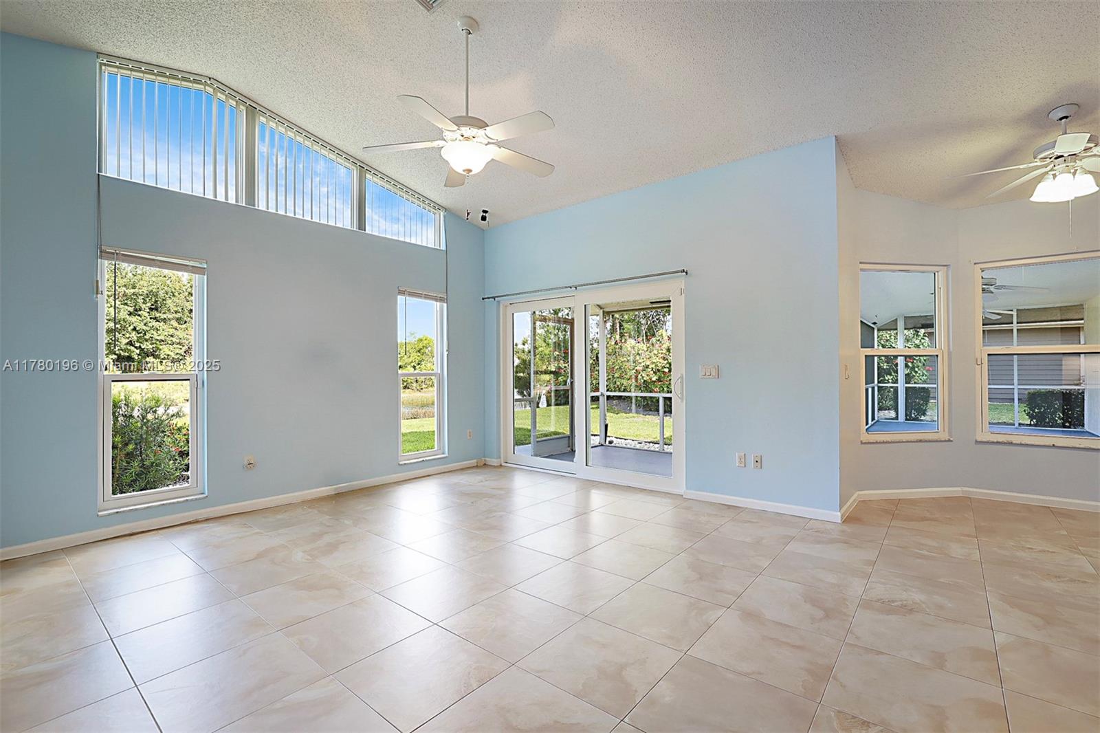 18295 Lake Bend Drive Jupiter, FL 33458 - Photo 23 of 64 a view of an empty room with a window