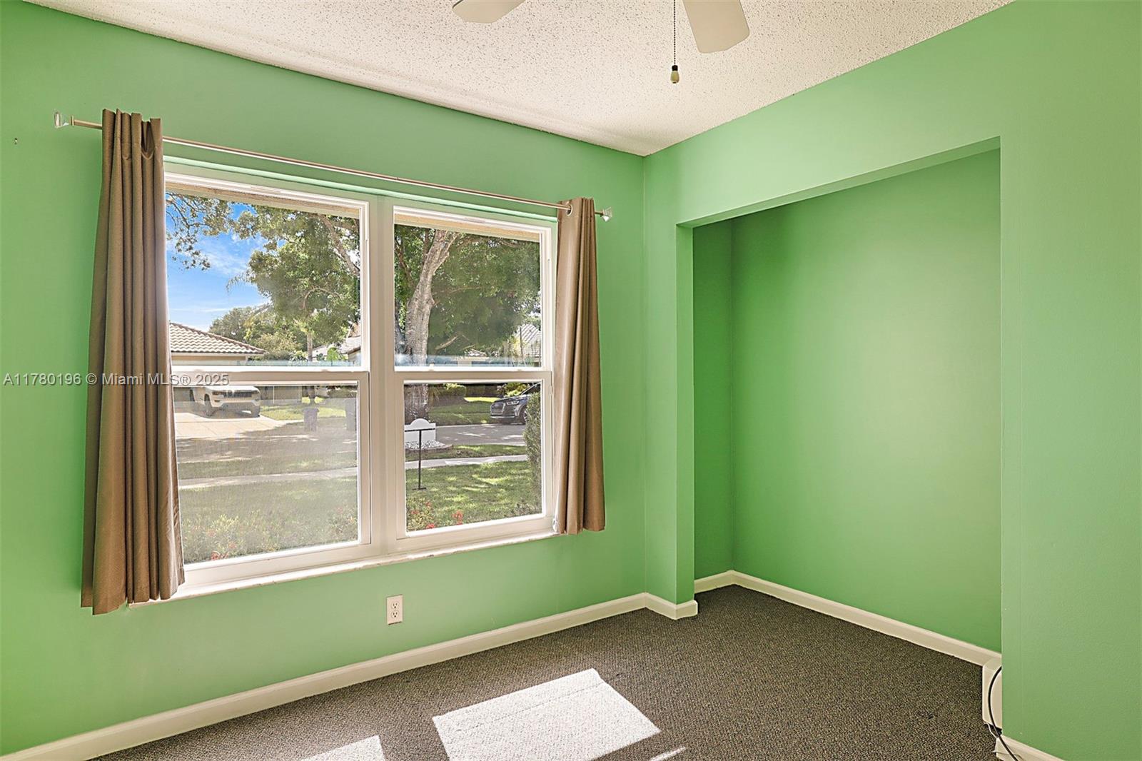 18295 Lake Bend Drive Jupiter, FL 33458 - Photo 35 of 64 a view of an empty room with a window