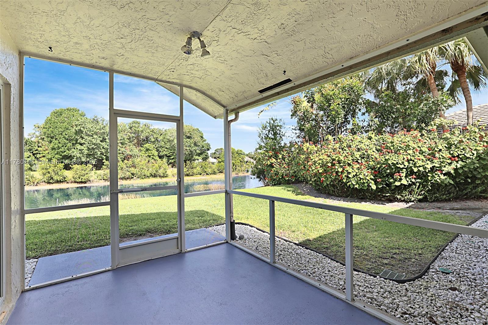 18295 Lake Bend Drive Jupiter, FL 33458 - Photo 39 of 64 a view of a backyard