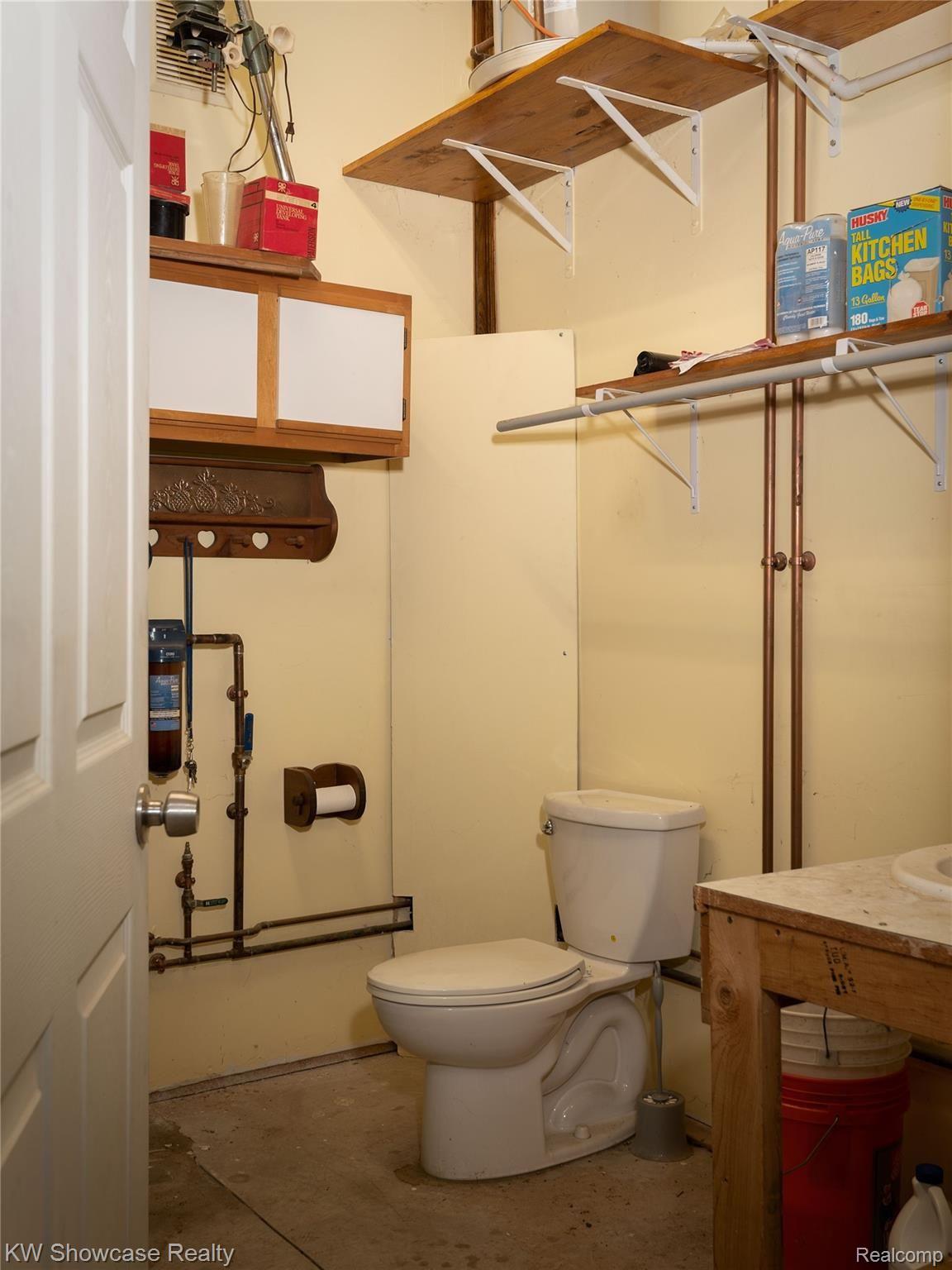6020 North Tipsico Lake Road Holly, MI 48442 - Photo 41 of 54 41 INTERIOR SHOP HALF BATH.jpg