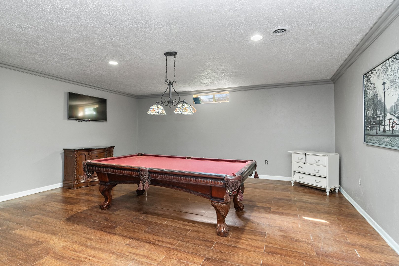 1212 Sycamore Road DeKalb, IL 60115 - Photo 26 of 44 a room with table chairs and wooden floor