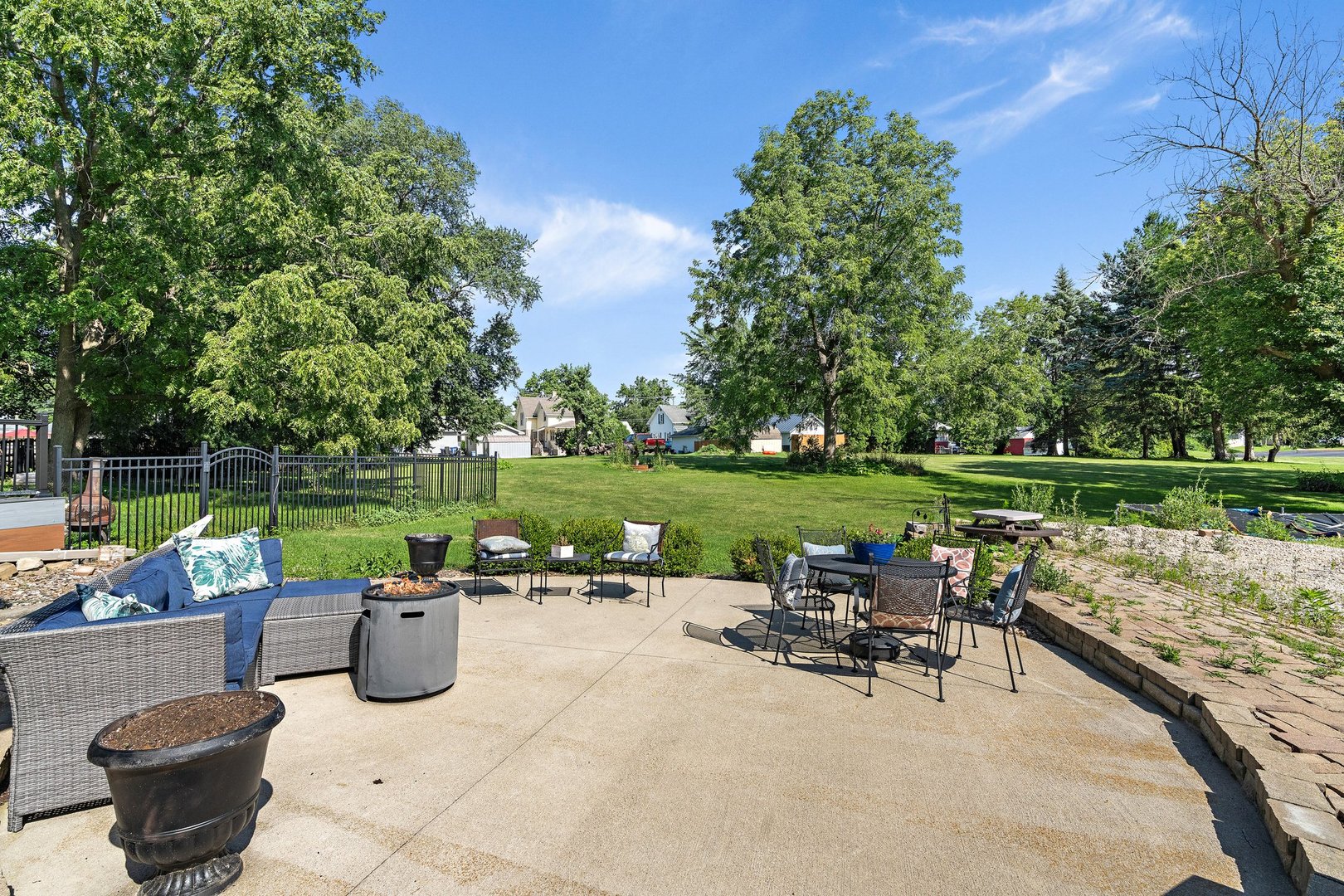 1212 Sycamore Road DeKalb, IL 60115 - Photo 29 of 44 a view of a swimming pool and lounge chairs in back yard of the house