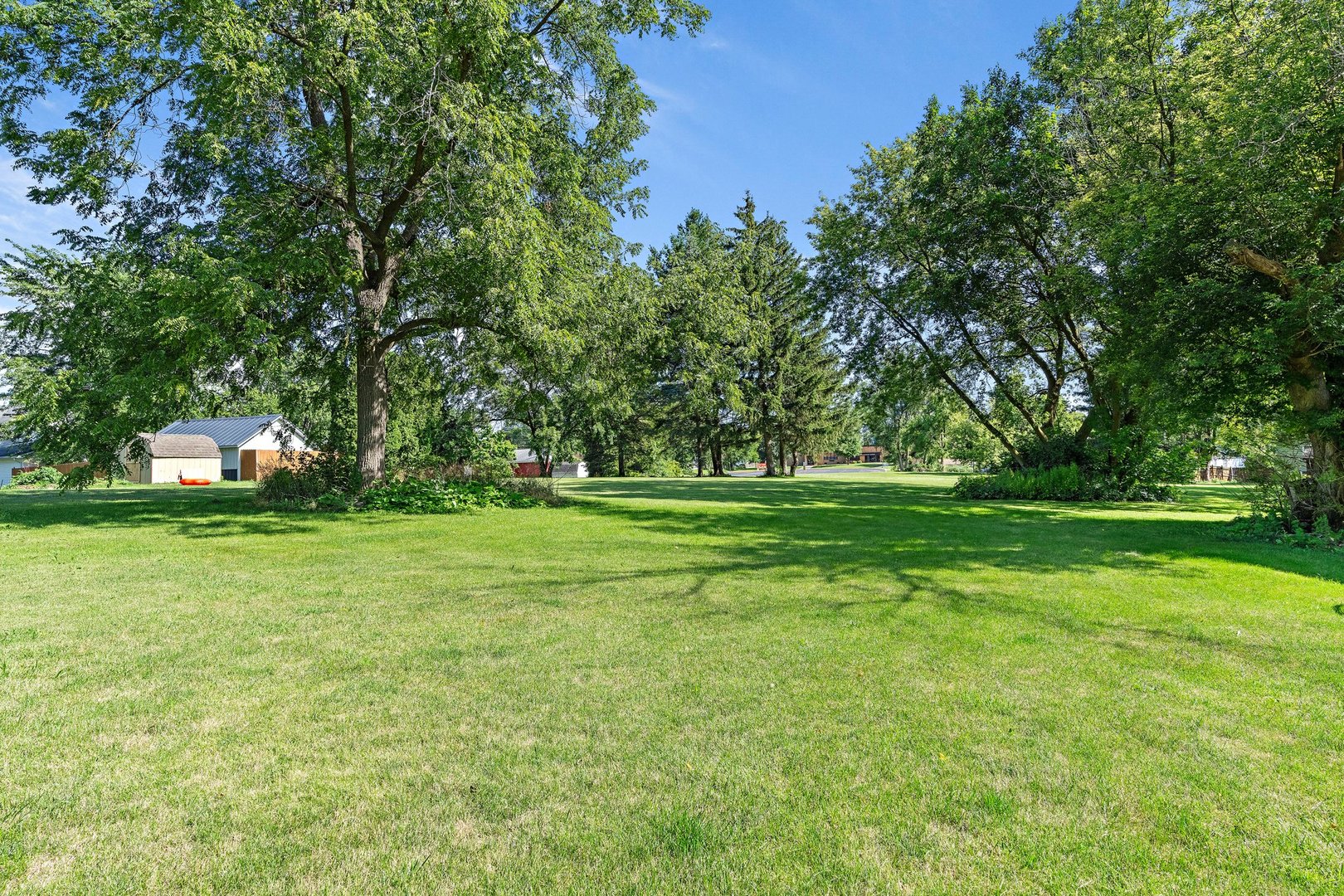 1212 Sycamore Road DeKalb, IL 60115 - Photo 30 of 44 a view of a park with trees