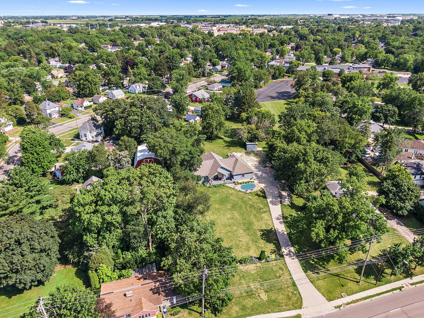 1212 Sycamore Road DeKalb, IL 60115 - Photo 38 of 44 an aerial view of residential houses with outdoor space and trees