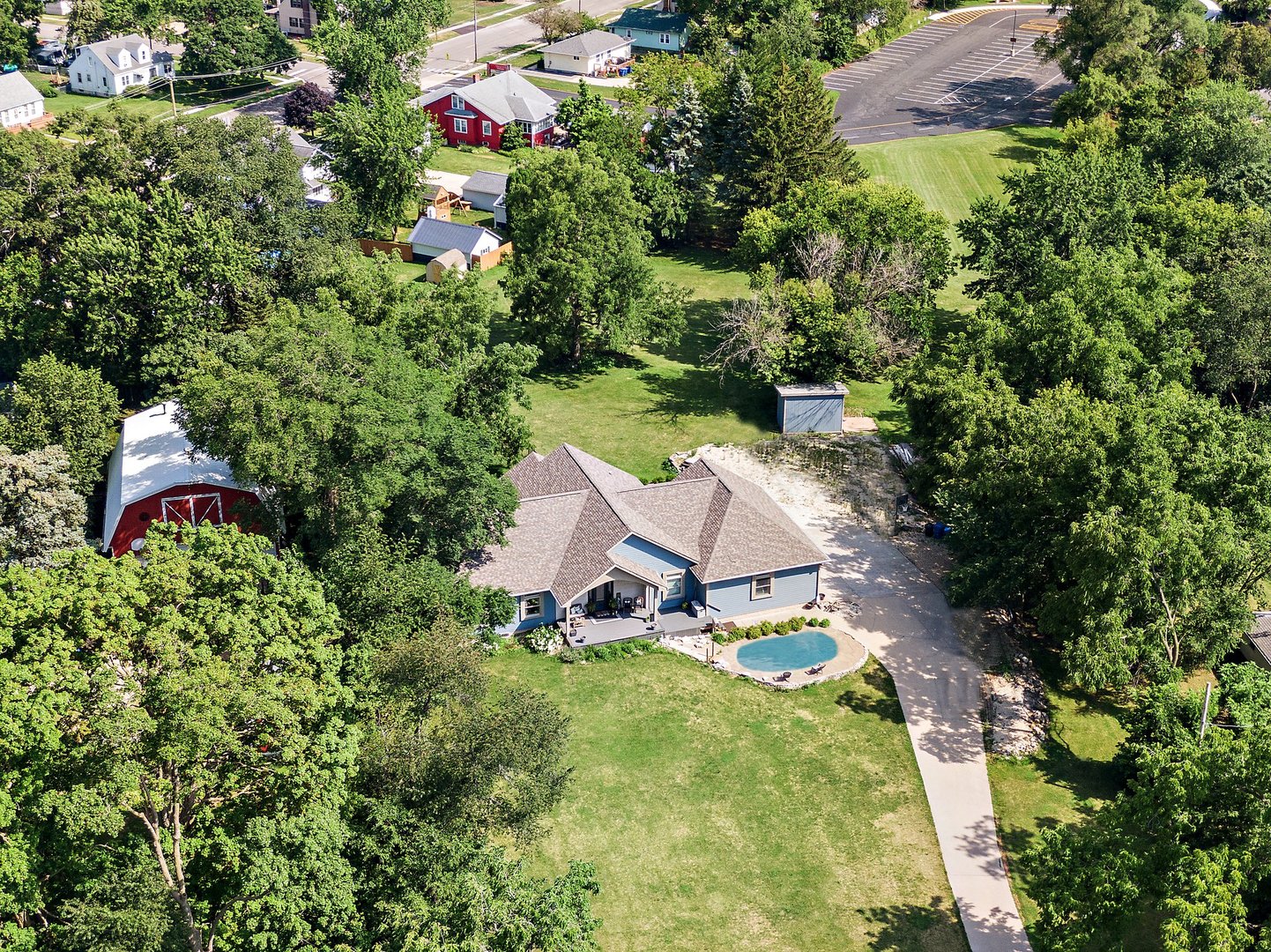 1212 Sycamore Road DeKalb, IL 60115 - Photo 39 of 44 an aerial view of a house with a yard and lake view