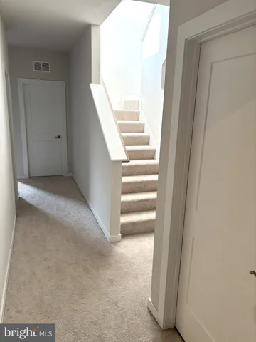 a view of entryway with stairs