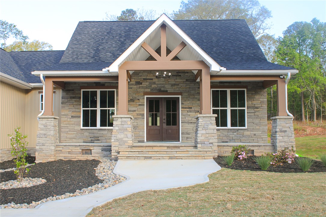2515 Highway 29 Anderson, SC 29621 - Photo 2 of 38 Crafted with stone veneer and a welcoming front porch, this residence offers charming curb appeal.