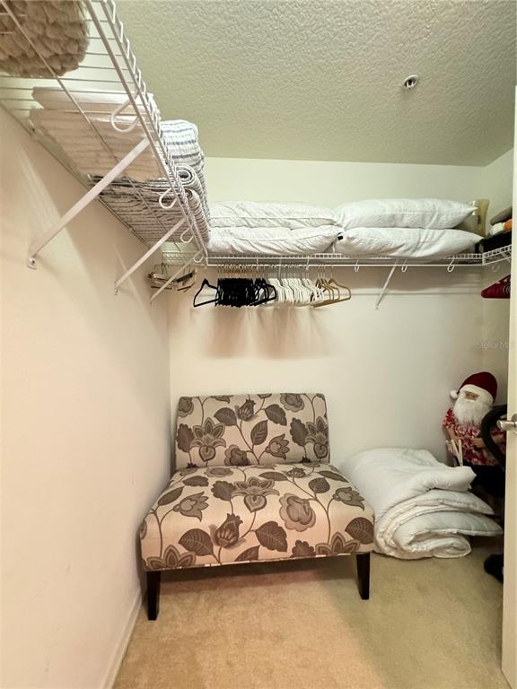 7212 Hamilton Road, Unit 7212 Bradenton, FL 34209 - Photo 19 of 46 a bedroom with a bed and a table