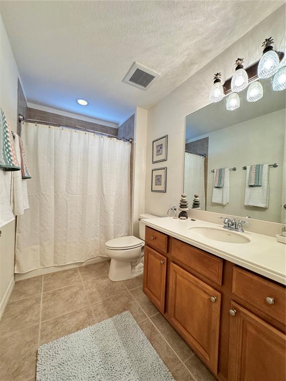 7212 Hamilton Road, Unit 7212 Bradenton, FL 34209 - Photo 29 of 46 a spacious bathroom with a double vanity sink mirror and toilet