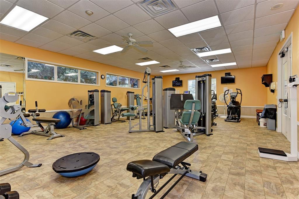 7212 Hamilton Road, Unit 7212 Bradenton, FL 34209 - Photo 35 of 46 a view of a room with gym equipment