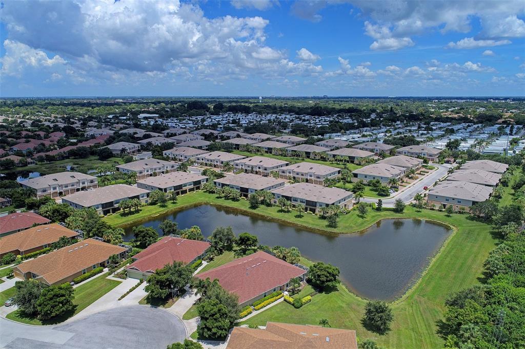 7212 Hamilton Road, Unit 7212 Bradenton, FL 34209 - Photo 41 of 46 an aerial view of residential houses with outdoor space