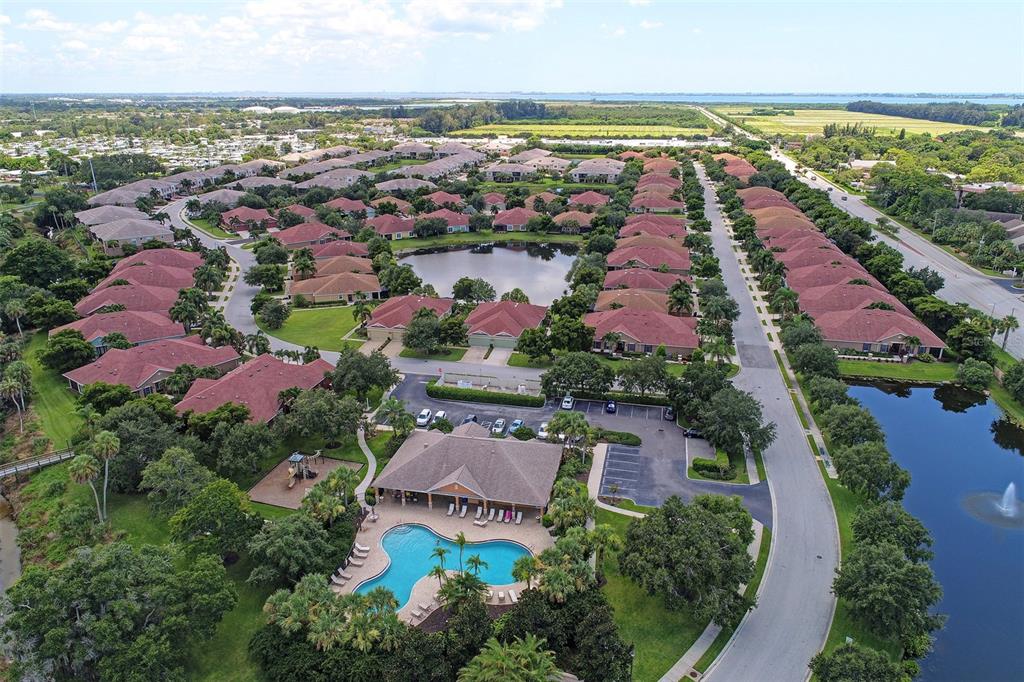 7212 Hamilton Road, Unit 7212 Bradenton, FL 34209 - Photo 46 of 46 an aerial view of residential houses with outdoor space