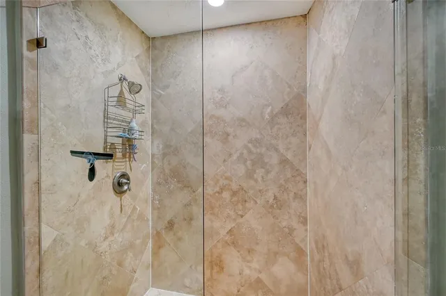 a view of a lake with a house in the background